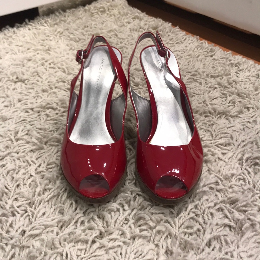 Red peep toe pumps